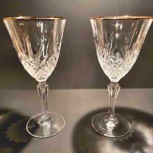 Beautiful vintage gold rimmed crystal wine glasses. Set Of 2.